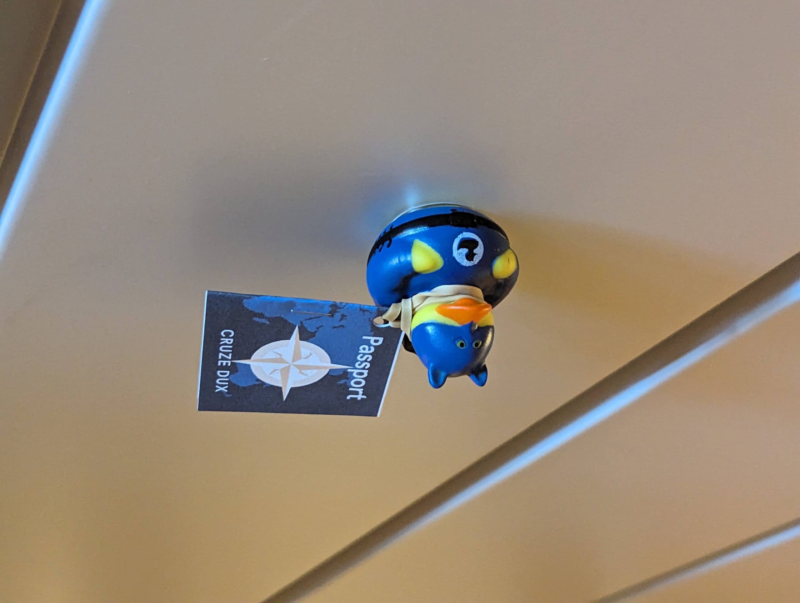 superhero cruise duck clinging to the ceiling